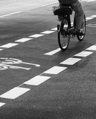 Black and Whote photo of a bike in bike lane