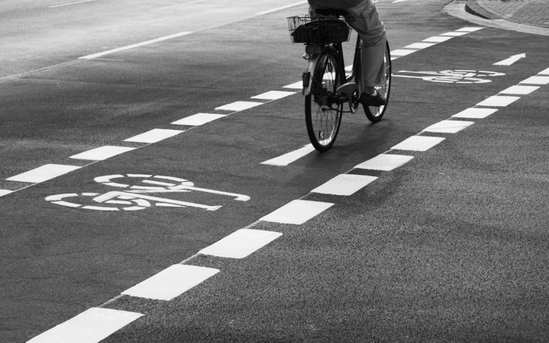 Black and Whote photo of a bike in bike lane