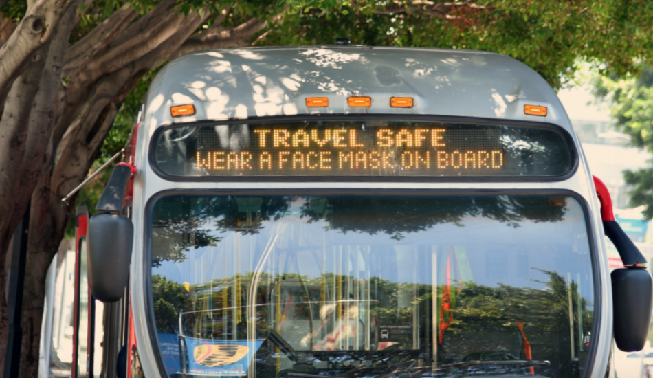 Rollsign on LA Metro bus reminds riders to wear a mask.